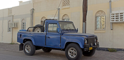 Land Rover Defender LWB Pick-up Oman Muscat Drive-by Snapshot by Sebastian Motsch front