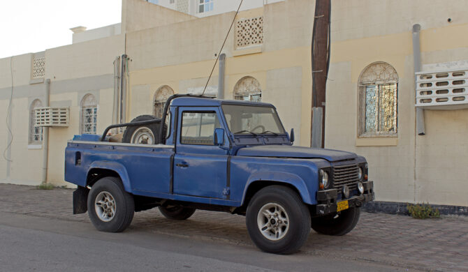 Land Rover Defender LWB Pick-up Oman Muscat Drive-by Snapshot by Sebastian Motsch front