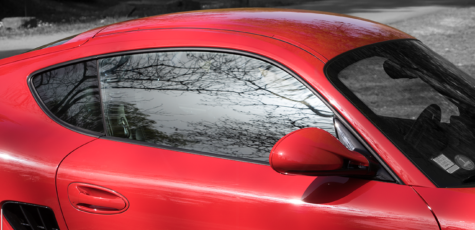 Porsche Cayman Reflections Drive-by Snapshot by Sebastian Motsch