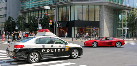 Japan Tokyo Roppongi Ferrari 512TR and Subaru Legacy Police Car by Sebastian Motsch