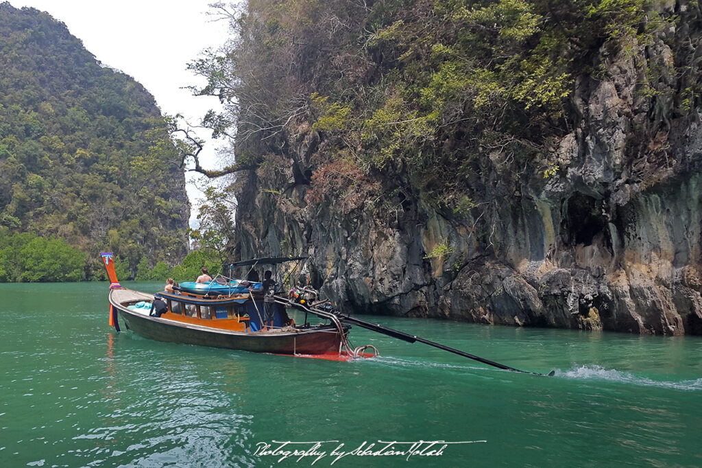 Long Tail Boat in Bay Thailand Rai Leh Photo by Sebastian Motsch