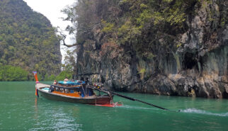 Long Tail Boat in Bay Thailand Rai Leh Photo by Sebastian Motsch