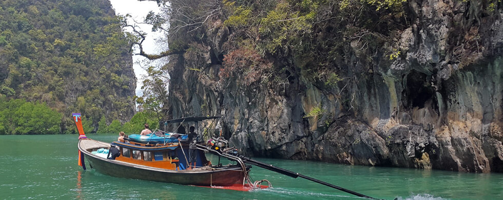 Long Tail Boat in Bay Thailand Rai Leh Photo by Sebastian Motsch